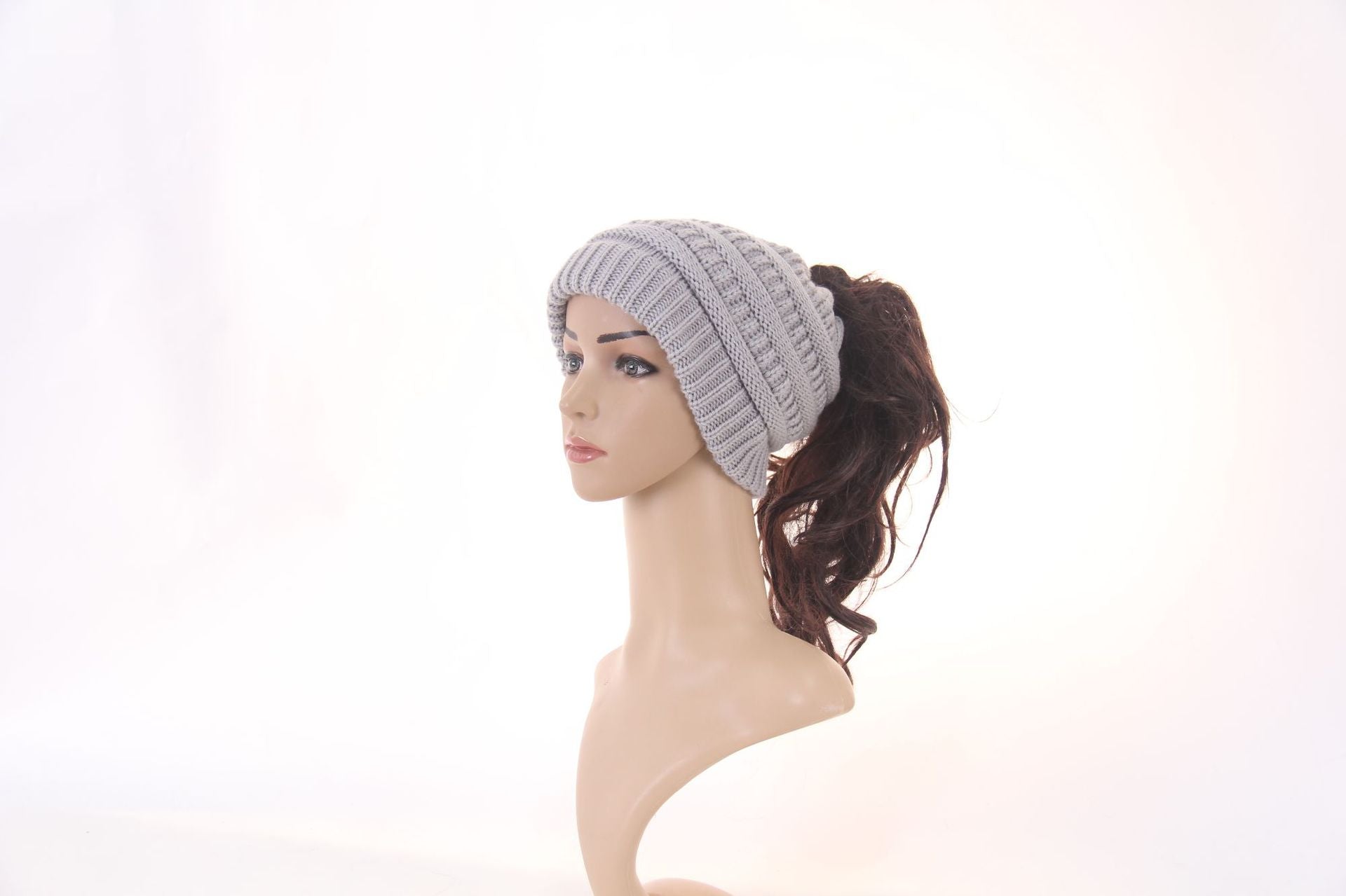 Manufacturer's new European and American popular knitted ponytail hats, women's fashion hats, wool hoods wholesale Muselune