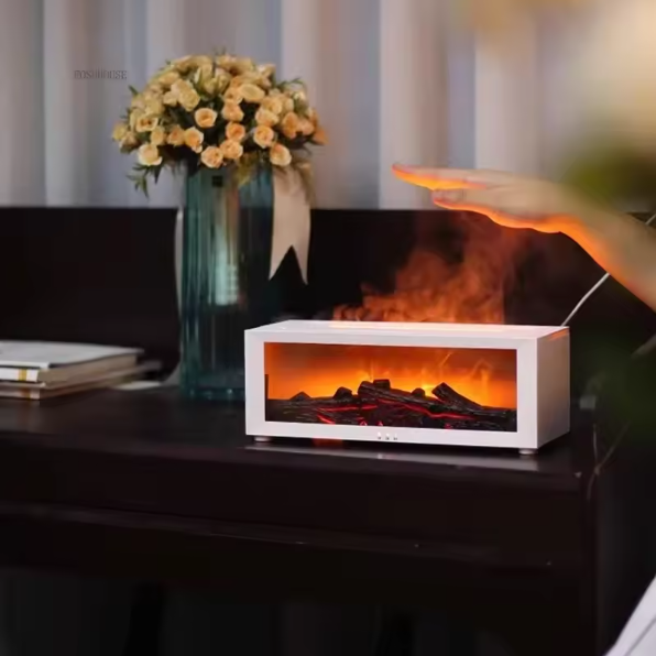 Fireplace Flame Humidifier on a desk with a vase of flowers in the background